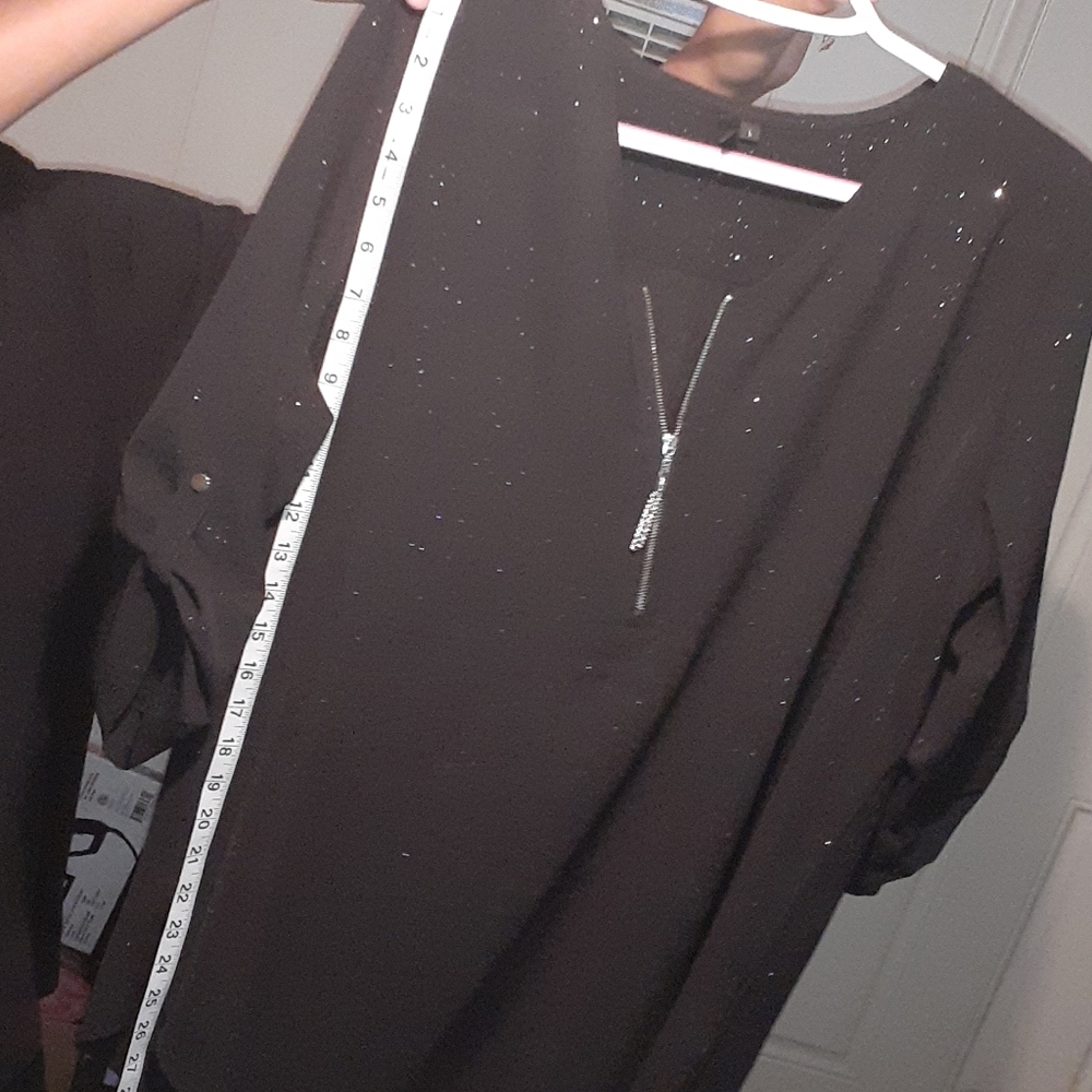 Black blouse with silver glitter and quarter zippe